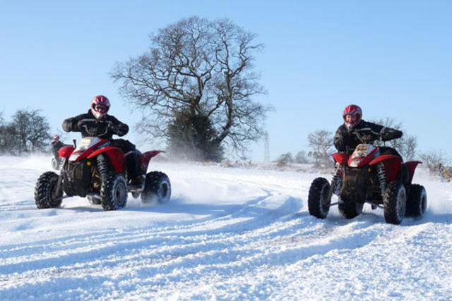 Corporate Christmas Party Ideas Quad biking in the snow