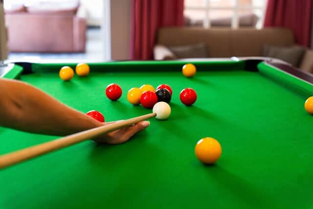 Enjoy a game of pool during your stay
